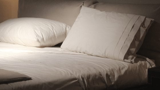 image of a warm, welcoming bed