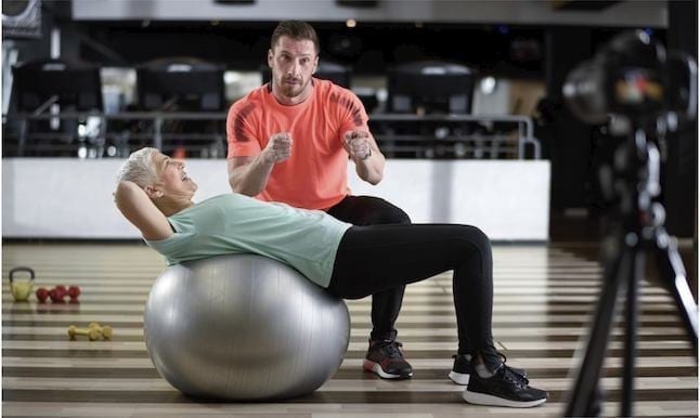 image of a lady working out in a health club