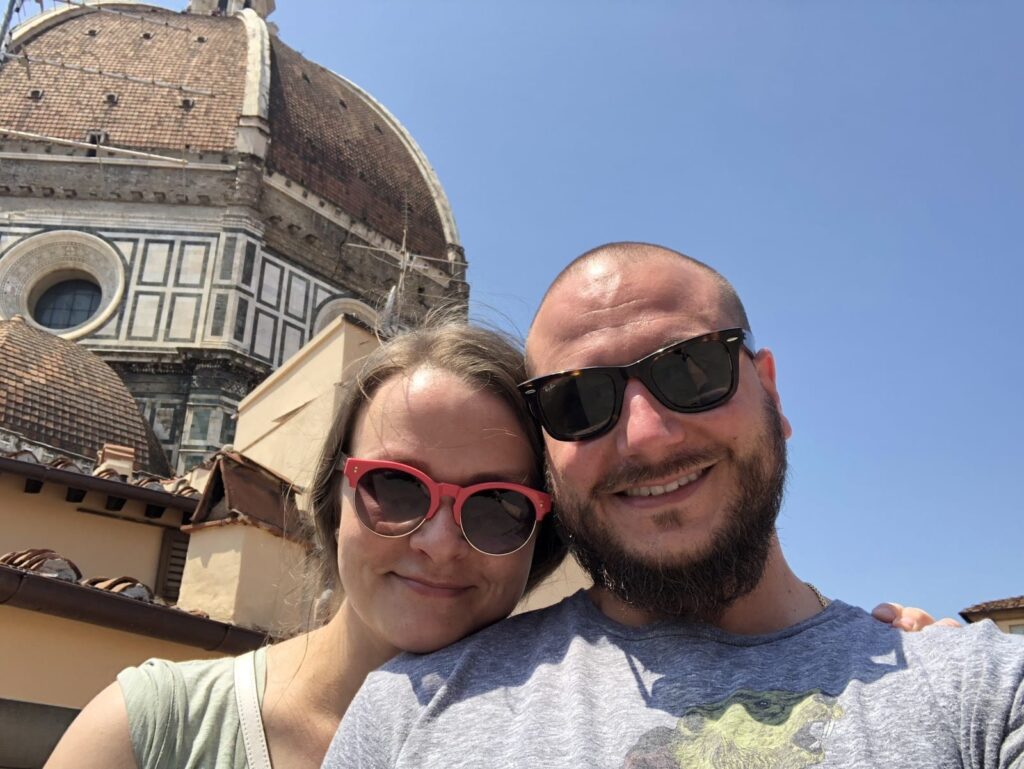 an image of Jim and his badass wife, Erin in Italy achieving work life balance